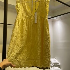 Yellow Romper from These Three Boutique